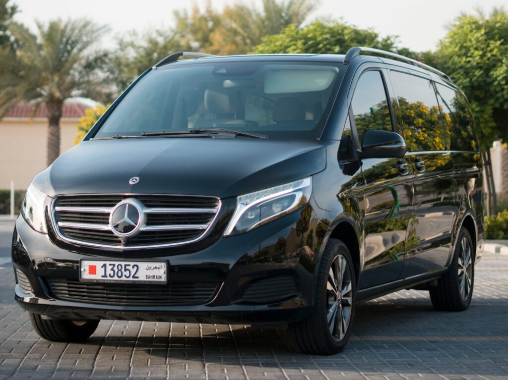 High-end sedan and SUV car rentals for corporate travel in Kuwait.